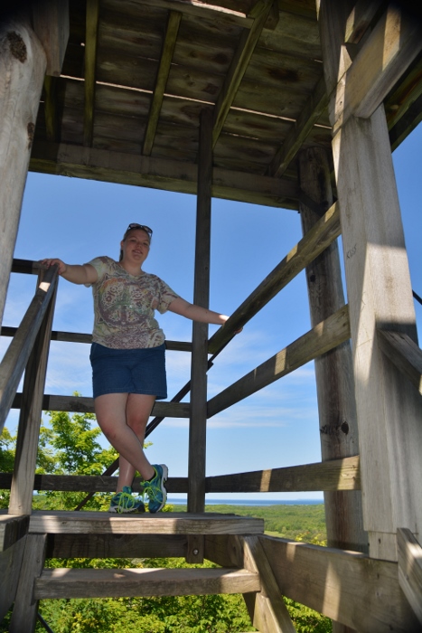 madi on the stairs to the tower